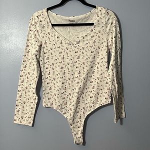 VS pink floral bodysuit